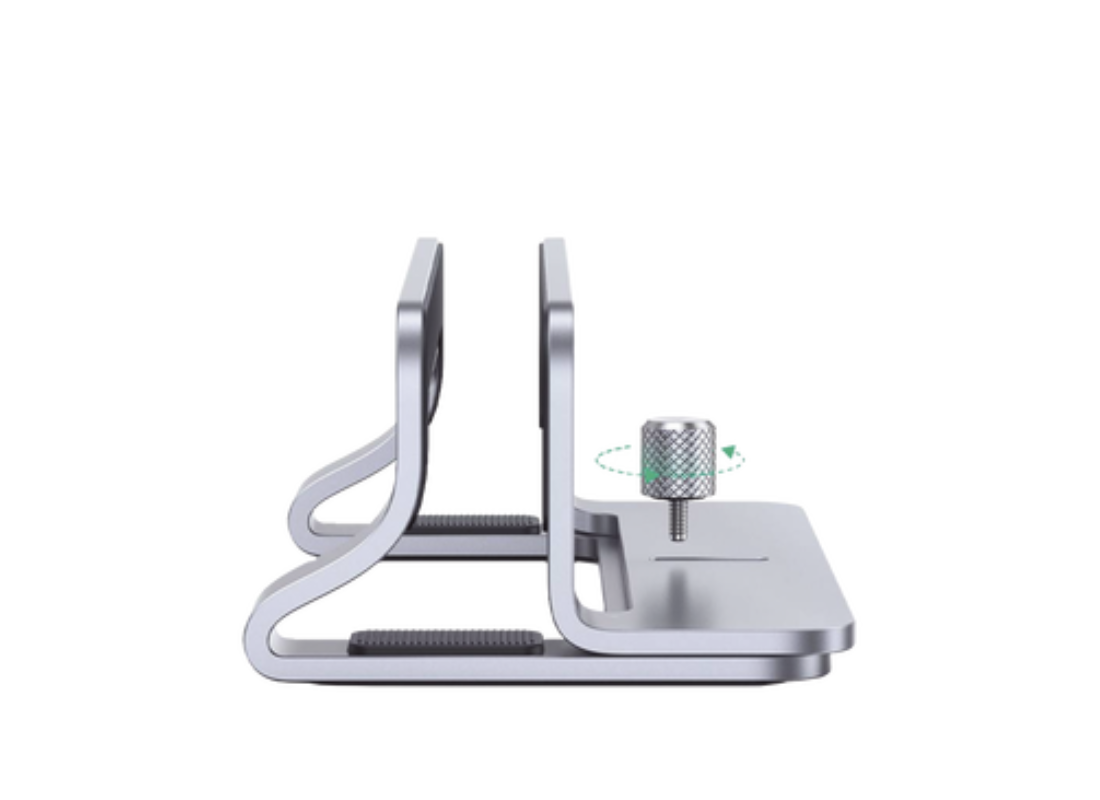 Soporte Vertical para Laptop / Adecuado para escritorio / Anchura Ajustable (12-26mm) / Amplia compatibilidad / Anti-Arañazos / Anti-Deslizante /Ajustable Mediante Tornillos / Color Plata / Aluminio + Silicona